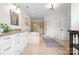 Elegant bathroom with double sinks, soaking tub, and spacious layout at 1754 Sterling Rd, Charlotte, NC 28209