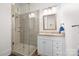 Bathroom featuring a glass enclosed shower and vanity with stone countertop at 1754 Sterling Rd, Charlotte, NC 28209
