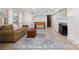 Inviting living room featuring tile floors, neutral walls, natural light and comfortable seating at 1754 Sterling Rd, Charlotte, NC 28209