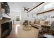 Bright, open living area featuring a fireplace and open access to kitchen at 1754 Sterling Rd, Charlotte, NC 28209
