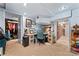 Basement showing a closet, desk, carpeted floors and access to another room at 204 Sylvania Ave, Charlotte, NC 28206