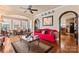 Open living space with hardwood floors flowing into the dining area at 204 Sylvania Ave, Charlotte, NC 28206