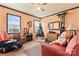 Cozy living room features neutral carpet, a fireplace and comfortable seating at 204 Sylvania Ave, Charlotte, NC 28206