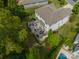 Aerial view of a home with a deck and a pool surrounded by a well-maintained backyard at 2108 Clarion Dr, Fort Mill, SC 29707
