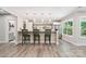 Entertain in this spacious area featuring a bar and kitchen with stainless steel appliances at 2108 Clarion Dr, Fort Mill, SC 29707