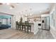 Entertain in this spacious area featuring a bar and kitchen with stainless steel appliances at 2108 Clarion Dr, Fort Mill, SC 29707