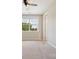 Cozy bedroom with ceiling fan and window overlooking green trees at 2108 Clarion Dr, Fort Mill, SC 29707