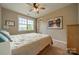 Bedroom with neutral walls and a large window providing exterior views at 2108 Clarion Dr, Fort Mill, SC 29707