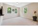 Bright bedroom with carpet flooring, neutral walls, and natural light from three windows at 2108 Clarion Dr, Fort Mill, SC 29707