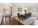 Elegant dining room with hardwood floors, a large table, and a stylish chandelier for memorable gatherings at 2108 Clarion Dr, Fort Mill, SC 29707
