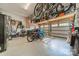 A very well organized garage featuring multiple bikes and tool storage at 2108 Clarion Dr, Fort Mill, SC 29707