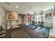 A well-equipped home gym with various weightlifting machines and durable rubber flooring at 2108 Clarion Dr, Fort Mill, SC 29707