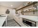 Stylish kitchen with modern appliances, white cabinets, and open shelving for ample storage at 2108 Clarion Dr, Fort Mill, SC 29707