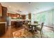 Open concept kitchen with stainless appliances, wood cabinets, an island, and eat in breakfast nook at 2108 Clarion Dr, Fort Mill, SC 29707