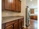 Open kitchen layout featuring granite countertops, stainless steel appliances and wood flooring at 2108 Clarion Dr, Fort Mill, SC 29707