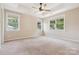 Spacious main bedroom featuring three windows, and neutral walls at 2108 Clarion Dr, Fort Mill, SC 29707