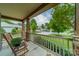 Charming covered front porch, perfect for relaxing and enjoying neighborhood views from comfortable rocking chairs at 2108 Clarion Dr, Fort Mill, SC 29707