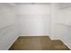 A walk-in closet with carpeted floor and wire shelving at 215 Madelia Pl, Mooresville, NC 28115