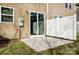 Cozy back patio with sliding glass door and white privacy fence for outdoor enjoyment at 2260 Hedgecliff Rd # 163, Kannapolis, NC 28025