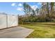 Spacious backyard features a privacy fence, concrete patio, and lush green grass at 2260 Hedgecliff Rd # 163, Kannapolis, NC 28025