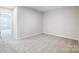 Neutral bedroom features carpeted floors, white walls, and a window at 2280 Hedgecliff Rd, Kannapolis, NC 28025