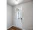 The interior entrance door of the home with light gray walls and dark wood flooring at 2280 Hedgecliff Rd, Kannapolis, NC 28025