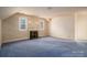 Spacious bedroom with carpeted floor, fireplace, and wallpapered walls at 246 Jerry Crump Rd, Lincolnton, NC 28092