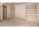 Bedroom featuring carpet, built-in shelves, and a neutral color scheme at 246 Jerry Crump Rd, Lincolnton, NC 28092