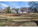 Exterior view showcases the home and detached garage situated on a sprawling lawn at 246 Jerry Crump Rd, Lincolnton, NC 28092