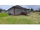 Brick exterior home with well-maintained backyard and patio at 258 Lagoda Dr, Locust, NC 28097
