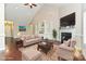 Cozy staged living room with a vaulted ceiling, fireplace and custom shelving at 258 Lagoda Dr, Locust, NC 28097
