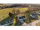 A high angle shot of the house with a large yard and mature trees at 2745 River Meadows Ct, Lincolnton, NC 28092
