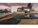 Backyard featuring an inground pool, patio and deck area covered by a gazebo at 2745 River Meadows Ct, Lincolnton, NC 28092