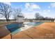 Backyard featuring an inground pool, pool house, and patio area at 2745 River Meadows Ct, Lincolnton, NC 28092