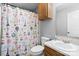 Bathroom with a Parisian themed shower curtain, gray walls and a single sink vanity at 2745 River Meadows Ct, Lincolnton, NC 28092