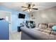 Bright bedroom with ample space for sleeping and work, featuring a built-in desk and ceiling fan at 2745 River Meadows Ct, Lincolnton, NC 28092
