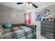 Cozy bedroom with decorative accents, natural light, and an ensuite bath at 2745 River Meadows Ct, Lincolnton, NC 28092