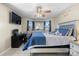 Comfortable bedroom with a plush bed, TV, and a window with natural light at 2745 River Meadows Ct, Lincolnton, NC 28092