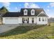 Charming two-story home featuring a well-maintained lawn and a two-car attached garage at 2745 River Meadows Ct, Lincolnton, NC 28092