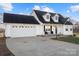 Charming two-story home featuring a well-maintained lawn and a two-car attached garage at 2745 River Meadows Ct, Lincolnton, NC 28092