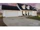 Charming two-story home featuring a well-maintained lawn and a two-car attached garage at 2745 River Meadows Ct, Lincolnton, NC 28092