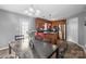 Bright kitchen with stainless steel appliances and an island with seating at 2745 River Meadows Ct, Lincolnton, NC 28092
