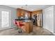 Bright kitchen featuring stainless steel appliances and an eat-in bar at 2745 River Meadows Ct, Lincolnton, NC 28092