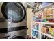 Well-organized laundry and pantry area with washer, dryer, and shelving at 2745 River Meadows Ct, Lincolnton, NC 28092