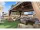 Inviting outdoor patio space featuring a gazebo and comfortable wicker furniture at 2745 River Meadows Ct, Lincolnton, NC 28092