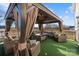 Inviting outdoor patio space featuring a gazebo and comfortable wicker furniture at 2745 River Meadows Ct, Lincolnton, NC 28092