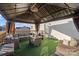 Inviting outdoor patio space featuring a gazebo and comfortable wicker furniture at 2745 River Meadows Ct, Lincolnton, NC 28092