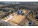 An aerial view of a charming single-Gathering home situated on a spacious lot with a long driveway at 2853 W Zion Church Rd, Shelby, NC 28150