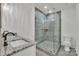 Bathroom featuring a glass shower, granite countertops, and modern fixtures at 2853 W Zion Church Rd, Shelby, NC 28150