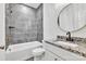 Elegant bathroom featuring granite counters, sleek fixtures, and tiled shower at 2853 W Zion Church Rd, Shelby, NC 28150